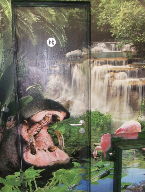 Custom Waterfall and Wildlife Door Mural for Bespoke Décor Bespoke waterfall and wildlife door mural featuring hippo and rhino in rainforest scene